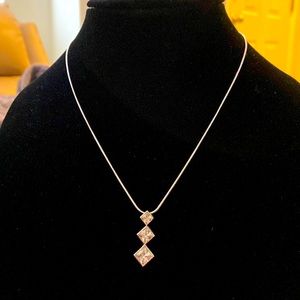 Three simulated diamond necklace 9” chain